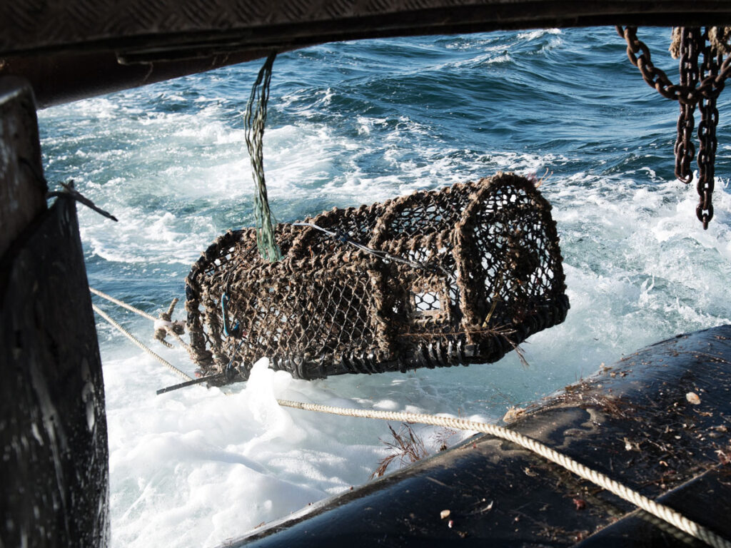 A pot being shot from a fishing vessel