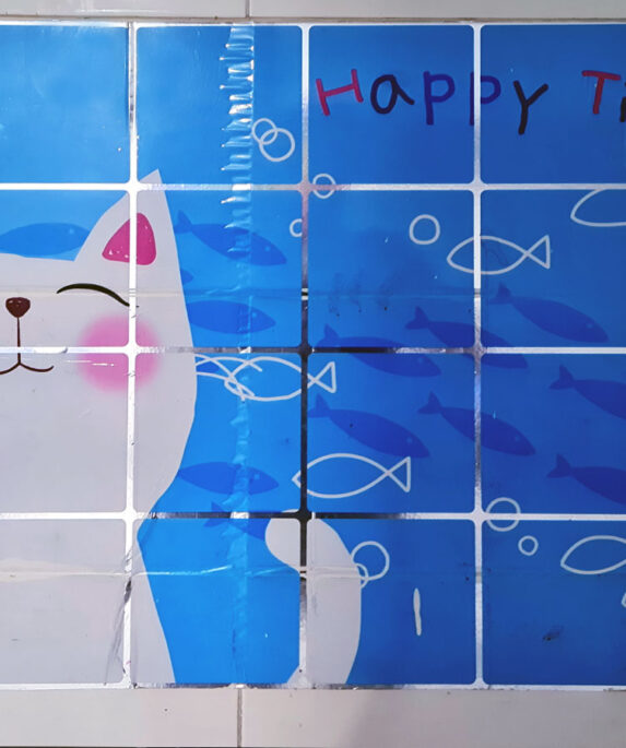 A happy cat depicted by tiles